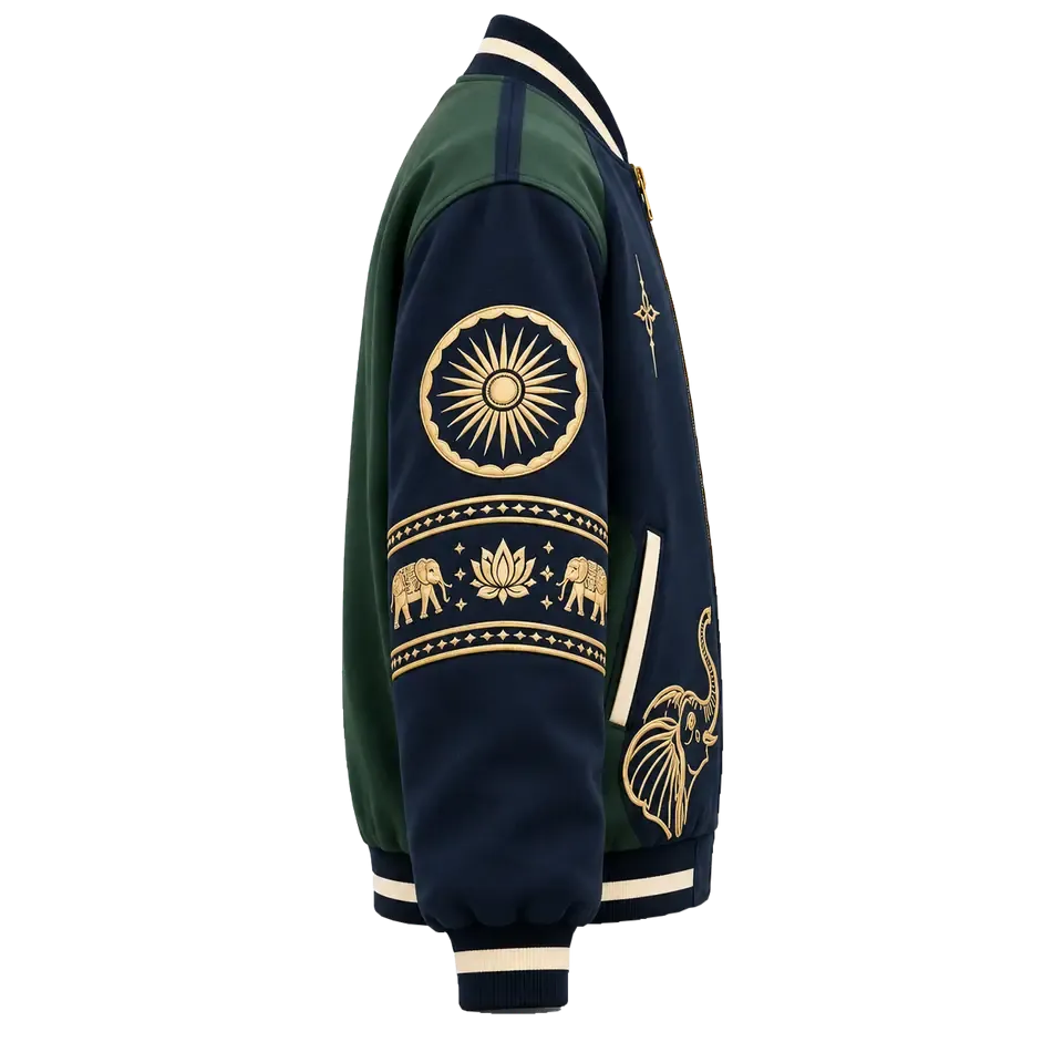 Golden Procession Jacket, right side: sleeve with a gold sun medallion above a band of paired elephants and lotus, zardozi-inspired embroidery